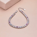 Regal Emerald Cut Bracelet for Women, Accented with Pink, Ruby, Aquamarine, and Yellow Stones