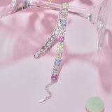 An Ethereal Trapezoidal Cut, Emerald Cut, and Round Cut Women's Bracelet adorned with Pink, White, and Yellow Stones