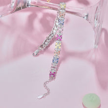An Ethereal Trapezoidal Cut, Emerald Cut, and Round Cut Women's Bracelet adorned with Pink, White, and Yellow Stones