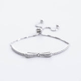 Elegant Round Cut Bow Design Bracelet For Women In Sterling Silver