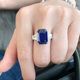 Gleaming 2.5ct Blue Sapphire Emerald Cut Engagement Ring In Sterling Silver