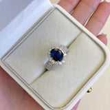 Oval Cut Blue Stone Halo Sterling Silver Engagement Ring