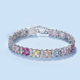 An Ethereal Trapezoidal Cut, Emerald Cut, and Round Cut Women's Bracelet adorned with Pink, White, and Yellow Stones