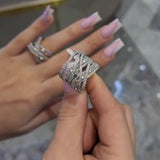 Elegant Criss Cross Pave Round Cut Wide Band Wedding Ring