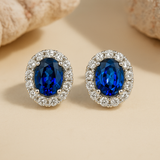 Dazzling Oval Cut Blue Stone Halo Sterling Silver Earrings