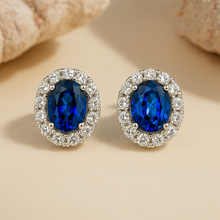 Dazzling Oval Cut Blue Stone Halo Sterling Silver Earrings
