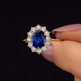 Dazzling 1.5ct Oval Cut Blue Stone Halo Sterling Silver Engagement Ring