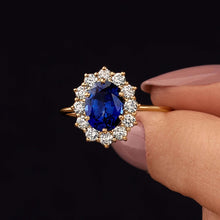 Dazzling 1.5ct Oval Cut Blue Stone Halo Sterling Silver Engagement Ring