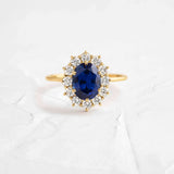 Dazzling 1.5ct Oval Cut Blue Stone Halo Sterling Silver Engagement Ring