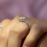 Fashionable Solarii Moissanite 2.0ct Emerald Cut 925 Sterling Silver Twist Design Engagement Ring