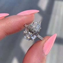Hidden Halo Pear Cut 4.5ct Engagement Ring In Sterling Silver
