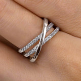 Modern Crossover Design CZ Wedding Band In 925 Sterling Silver