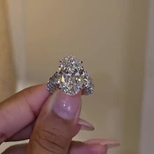 Glamorous Three-Stone Hidden Halo Oval Cut 10.0ct Engagement Ring