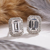 Solarii Halo Emerald Cut Stud Earrings In Sterling Silver
