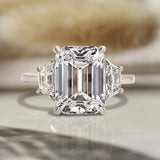 Lavish Emerald Cut 4.0ct Three Stone Engagement Ring In Sterling Silver