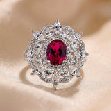 Dazzling Flower Shape 1.0ct Oval Cut Ruby Engagement Ring In Sterling Silver